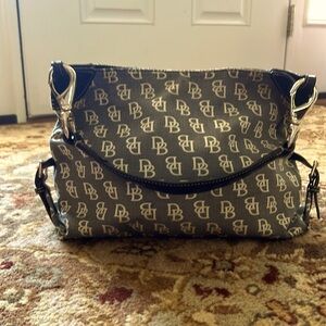 Dooney Bourke pocketbook. Great value!